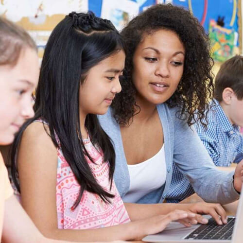 Teacher showing student camp selections