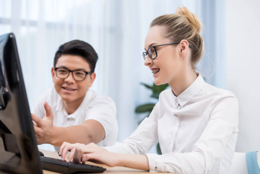 High school interns working together