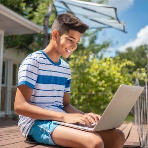 Boy in summer coding class.